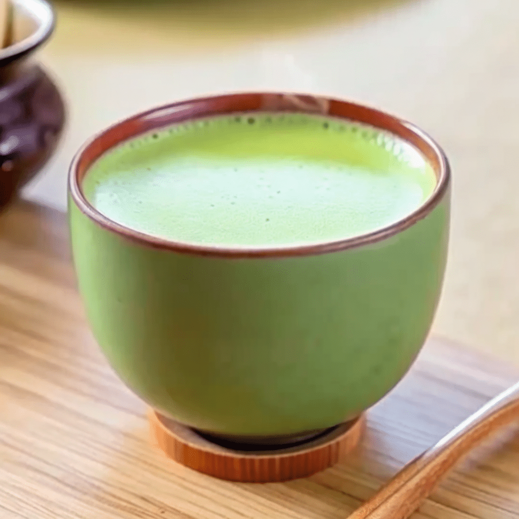 Japanese Mounjaro in a glass mug on a kitchen countertop with lemon.